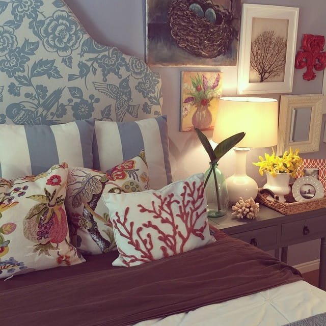 Transform your room into a summer paradise with a cozy bed adorned with a headboard and soft pillows.