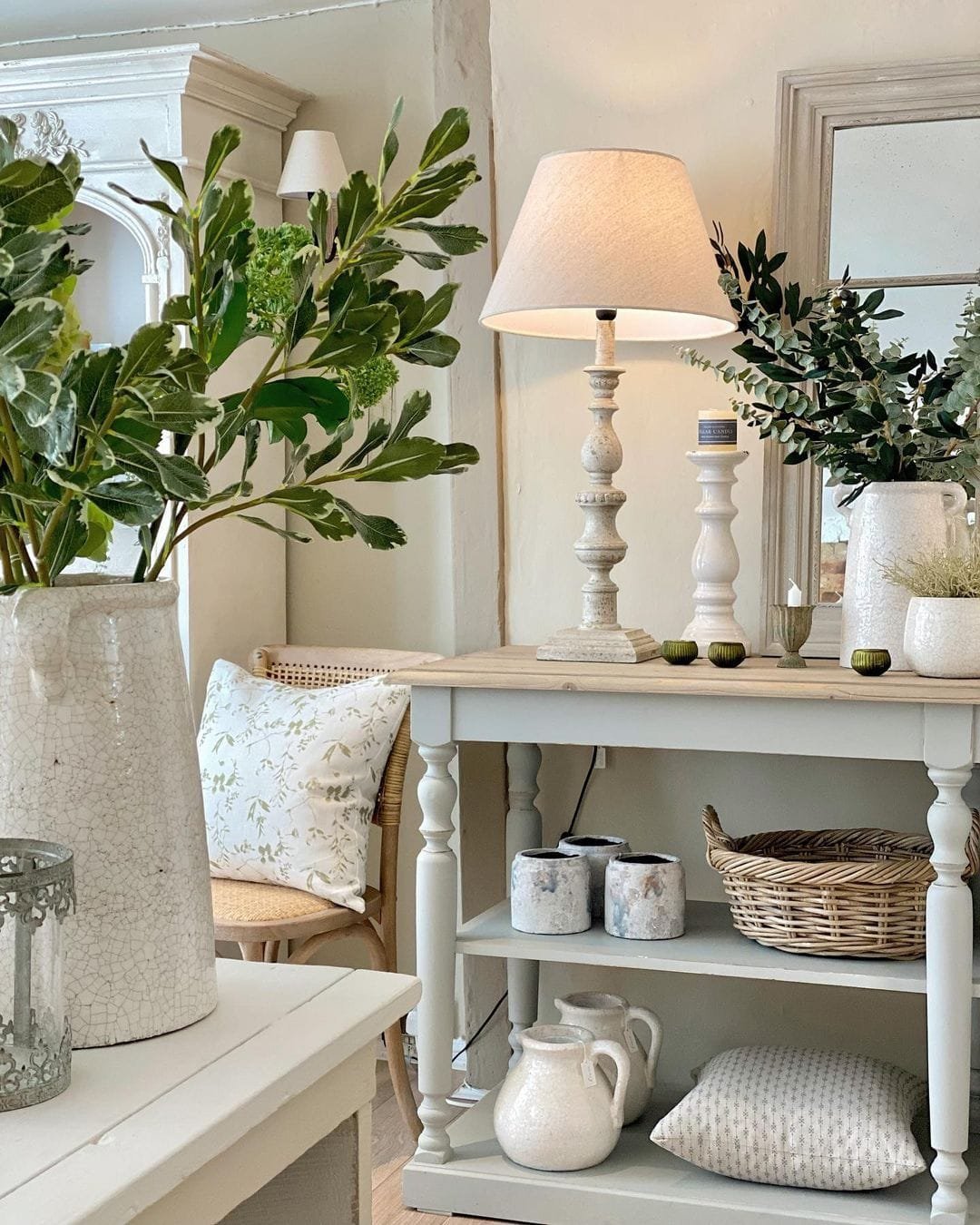 adding natural elements such as green plants in ceramic vases will instantly elevate your summer home decor.