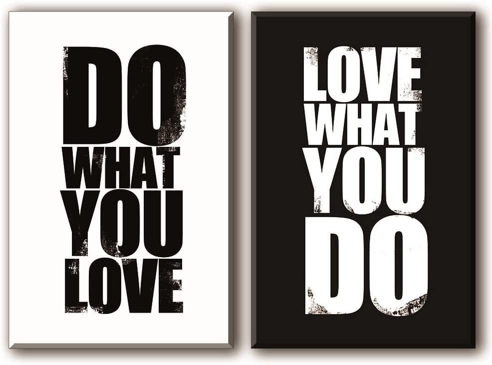 Two framed posters side by side; left poster has "DO WHAT YOU LOVE" in bold black letters on a white background, right poster says "LOVE WHAT YOU DO" in white letters on a black background, embodying what you need to set up a productive workspace at home.