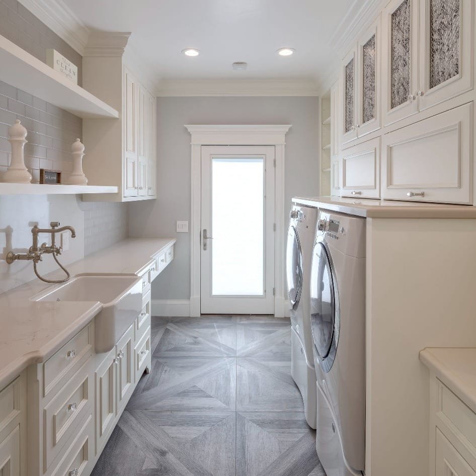 One way to Maximize Space in Your Long Narrow Laundry Room before construction is to consider the design of the layout and try to use opposite sides of the laundry walls for a more efficient laundry experience.