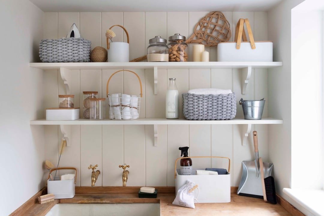 installing wall-mounted shelves for storage and display of commonly used laundry items will allow you to maximize your long narrow laundry space as effectively as possible.