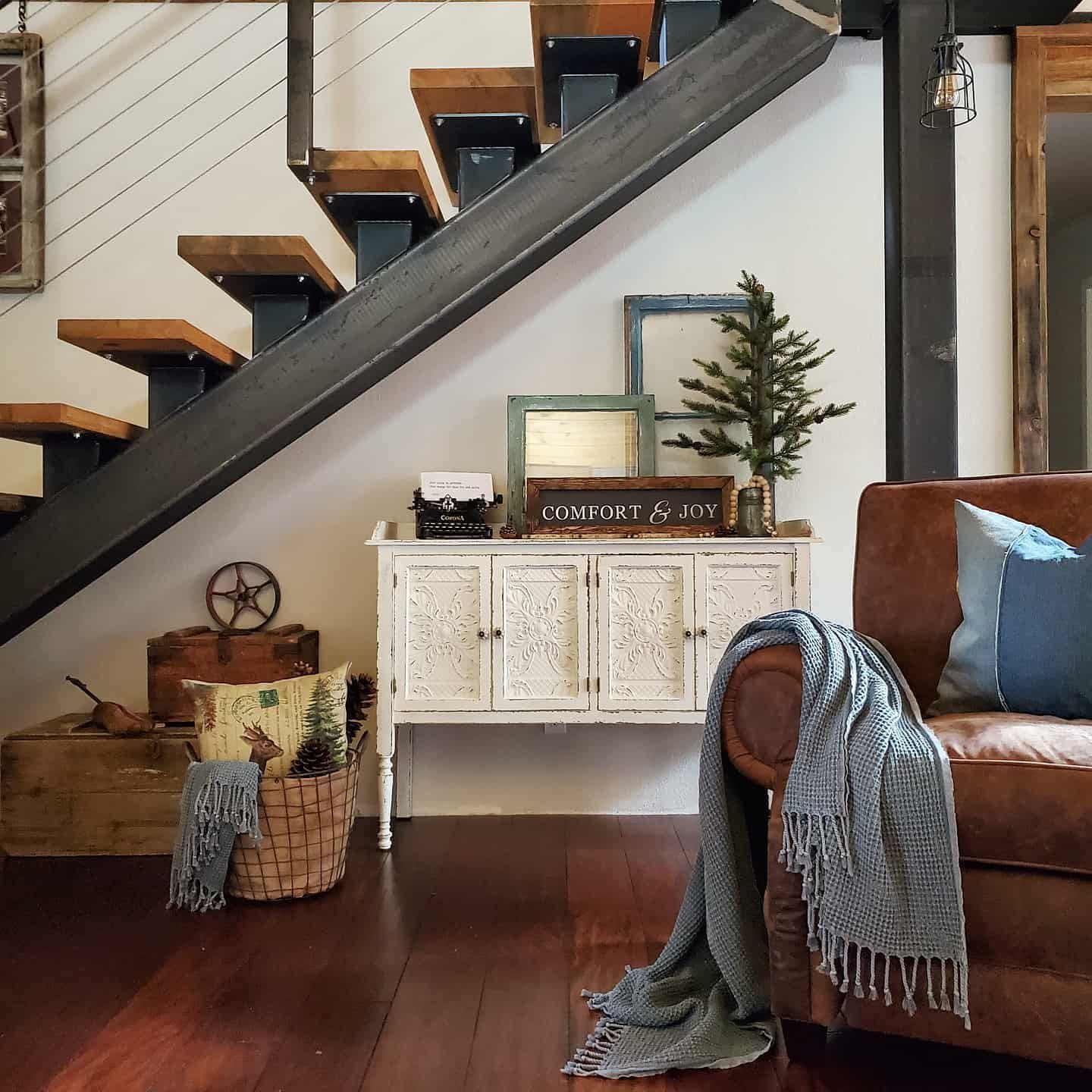 add a throw blanket and a throw pillow to a chair and see how the textile add texture to the overall decor
