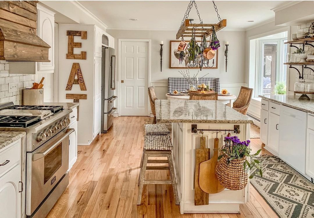 using an old wooden ladder hang to the ceiling as a creative pots and pans storage solution in a kitchen
