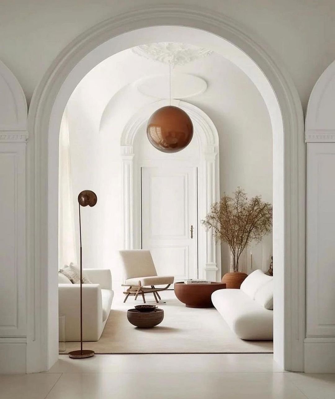interior of a minimalist living space with a neutral color palette and minimalist furniture