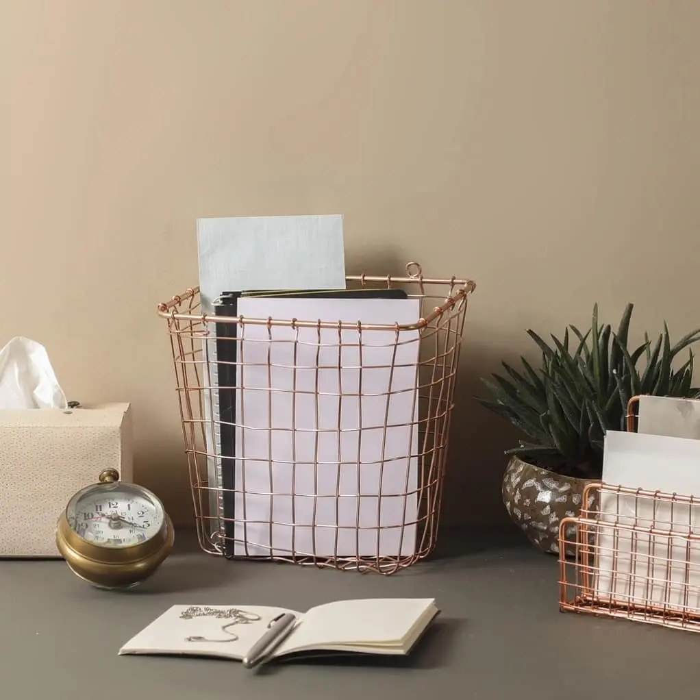 wire baskets are so versatile that they can easily find their use in the home office to hold notebooks, office supplies, and stationaries.
