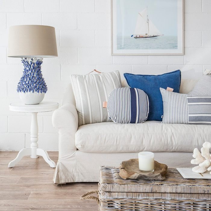 beach-themed living room embodies seaside elements and a laid-back vibes to capture the serene beauty of the coast.